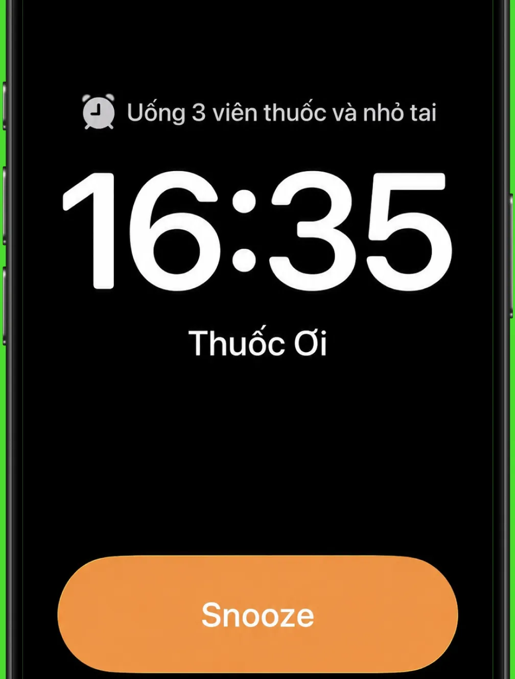 Màn hình báo thức Thuốc ơi trên iPhone lúc 16:35, nội dung uống 3 viên thuốc và nhỏ tai, có nút Snooze